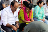 Students Perform Pada Pooja to Their Parents
