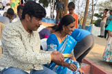 Students Perform Pada Pooja to Their Parents
