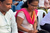 Students Perform Pada Pooja to Their Parents
