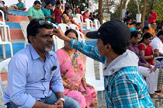 Students Perform Pada Pooja to Their Parents
